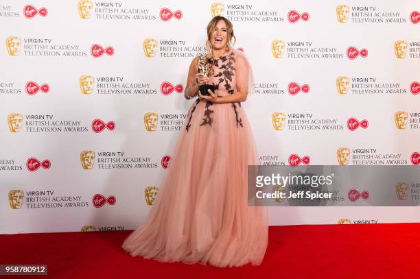 Caroline Flack poses with the award for Best Reality and Constructed Factual Series for 'Love Island' in the press room at the Virgin TV British...
