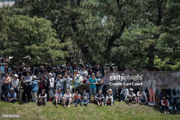 Spectators gather to watch the Aoi Festival on May 15, 2018 in Kyoto, Japan. Aoi Festival is one of the three main festivals of Japan's ancient...