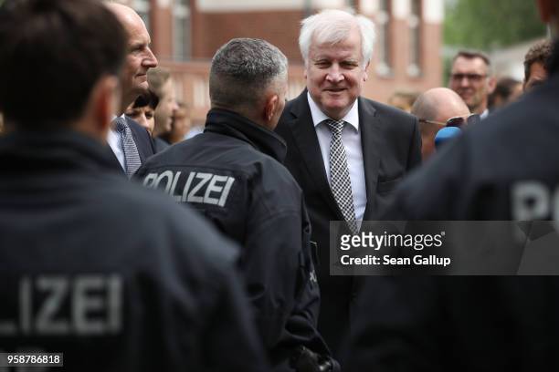 German Interior Minister Horst Seehofer chats with police officers, in which he told them: "Do you know you have the best job?" during a visit to the...
