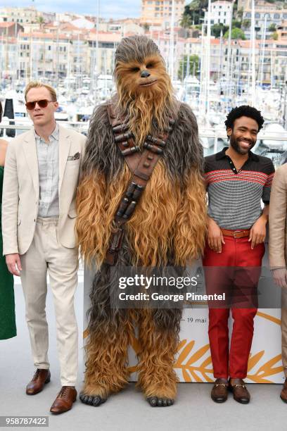 Paul Bettany, Chewbacca and Donald Glover attend the photocall for "Solo: A Star Wars Story" during the 71st annual Cannes Film Festival at Palais...