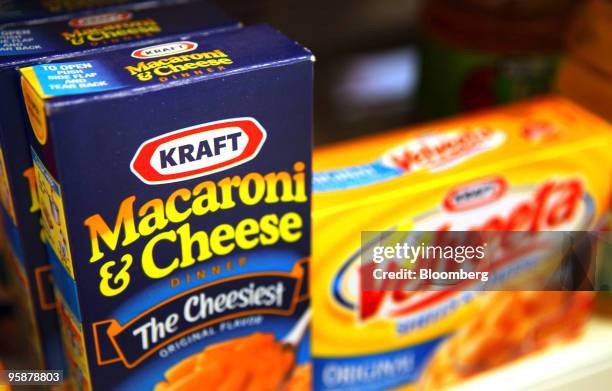 Boxes of Kraft Foods Inc. Velveeta Shells & Cheese and Macaroni & Cheese sit on a shelf in a convenience store in Des Plaines, Illinois, U.S., on...