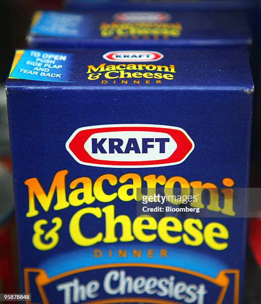 Boxes of Kraft Foods Inc. Macaroni & Cheese sit on a shelf in a grocery store in Glenview, Illinois, U.S., on Tuesday, Jan. 19, 2010. Cadbury Plc...
