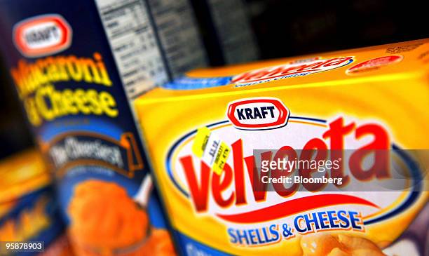 Boxes of Kraft Foods Inc. Velveeta Shells & Cheese and Macaroni & Cheese sit on a shelf in a convenience store in Des Plaines, Illinois, U.S., on...