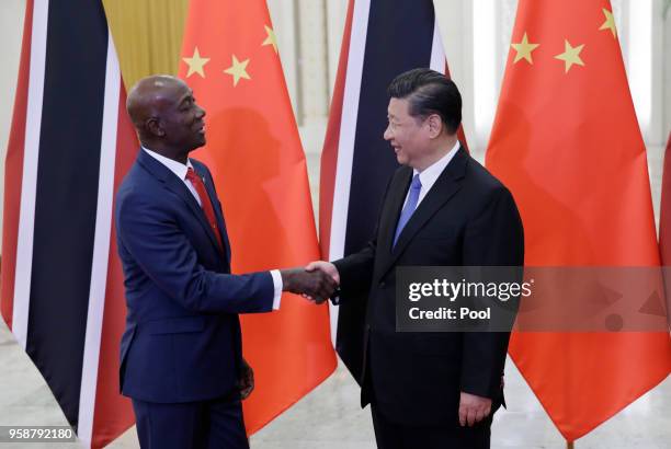 China's President Xi Jinping meets Trinidad and Tobago Prime Minister Keith Rowley at the Great Hall of the People on May 15, 2018 in Beijing, China.