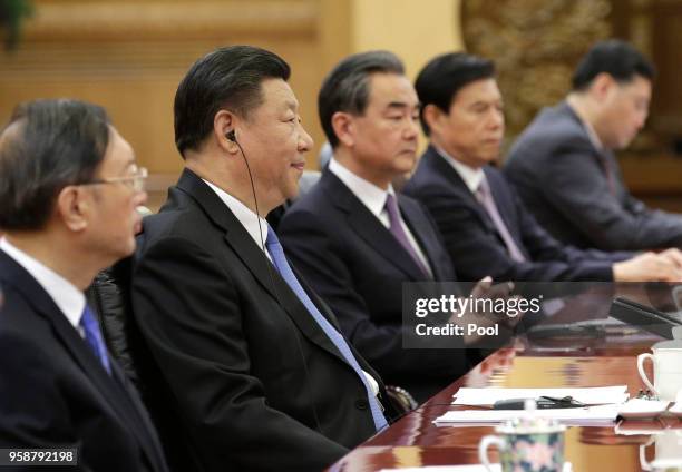 China's President Xi Jinping attends a meeting with Trinidad and Tobago Prime Minister Keith Rowley at the Great Hall of the People on May 15, 2018...