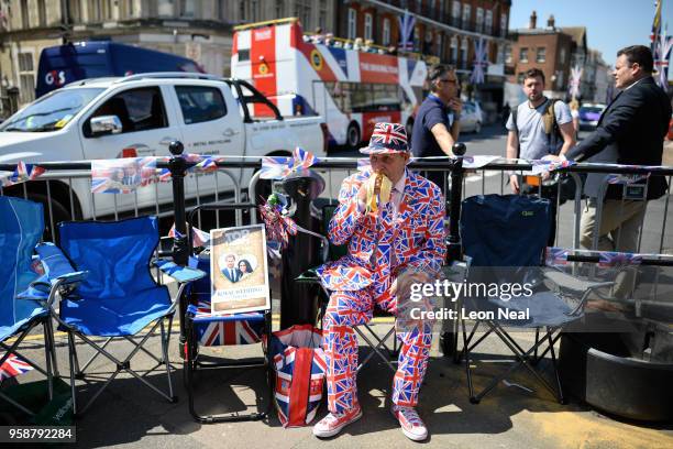 Royal fan Terry Hutt eats his lunch after setting up his position ahead of a four day wait for the royal wedding of Prince Harry and Meghan Markle,...