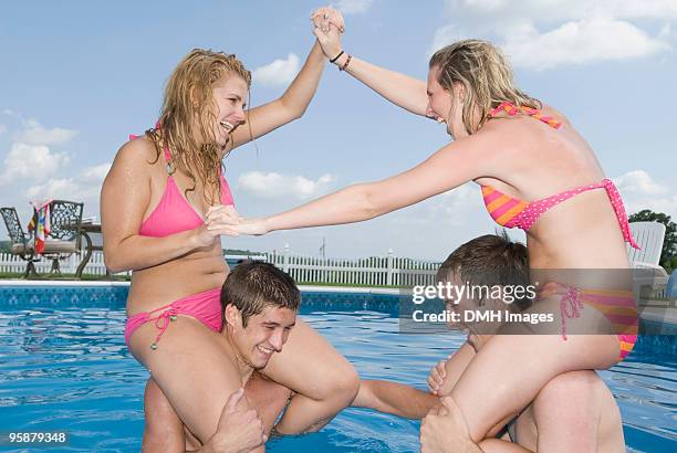 friends playing in the pool - bangor maine stockfoto's en -beelden