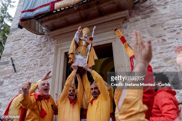 The St. Ubaldo ceraioli carry the statue of St. St. Ubaldo that will be on the top of their candle prior to the Corsa dei Ceri on May 15, 2018 in...