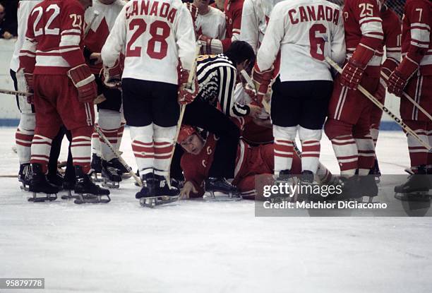 The Summit Series: Referee tending to Soviet Union player after sustaining injury during Game 5 vs Canada at Luzhniki Ice Palace. Moscow, Soviet...