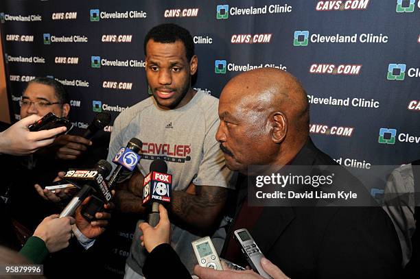 LeBron James of the Cleveland Cavaliers and Cleveland Brown legend Jim Brown answer questions on Dr. Martin Luther King Jr. Tribute Night prior to...