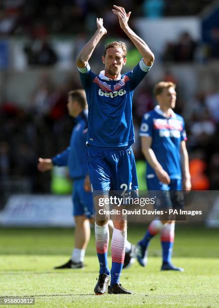 Stoke City's Peter Crouch applauds the fans at the end of the Premier League match at the Liberty Stadium, Swansea
