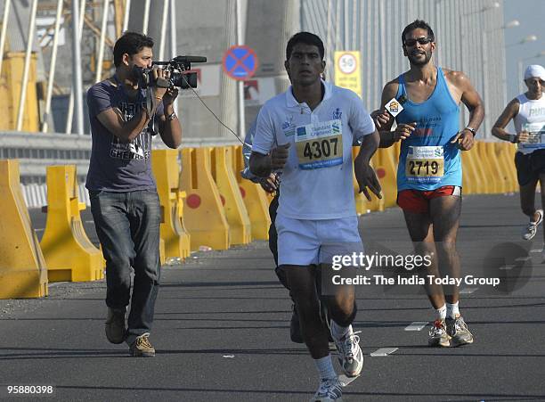 Milind Soman takes part in the Standard Chartered Mumbai marathon on Sunday, January 17, 2010.