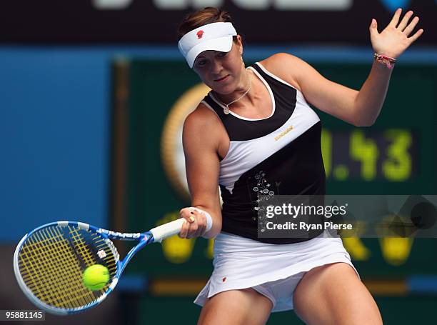 Anastasia Pavlyuchenkova of Russia plays a forehand in her second round match against Svetlana Kuznetsova of Russia during day three of the 2010...