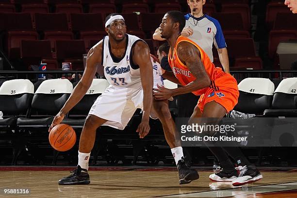 White of the Tulsa 66ers looks to make a move against Kurt Looby of the Albuquerque Thunderbirds during the 2010 D-League Showcase at Qwest Arena on...