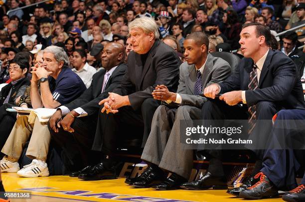 Assistant coach Keith Smart, head coach Don Neslon and assistant coaches Stephen Silas and Russell Turner of the Golden State Warriors sit on the...