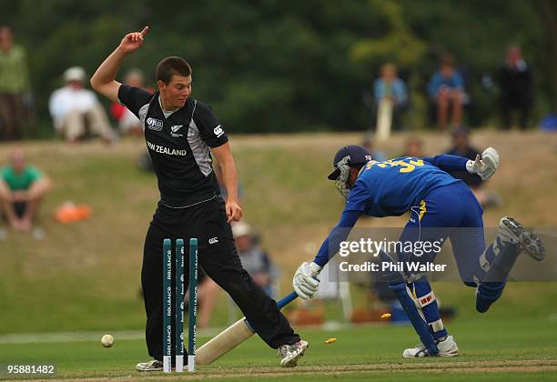 Tim Johnston of New Zealand celebrates the runout of Chathura Pieris of Sri Lanka during the ICC U19 Cricket World Cup match between New Zealand and...