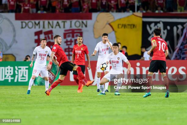 Guangzhou Midfielder Nemanja Gudelj in action against Tianjin Forward Zhao Xuri during the AFC Champions League Round of 16 second leg match between...