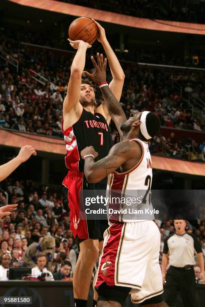 Andrea Bargnani of the Toronto Raptors shoots over LeBron James of the Cleveland Cavaliers on January 19, 2010 at The Quicken Loans Arena in...