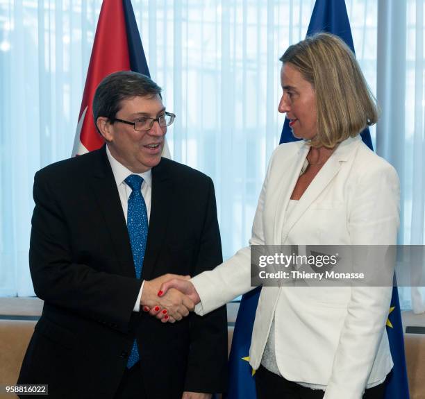 Cuban Foreign Affairs Minister Bruno Rodriguez is welcomed by the High Representative of the European Union for Foreign Affairs and Security Policy...