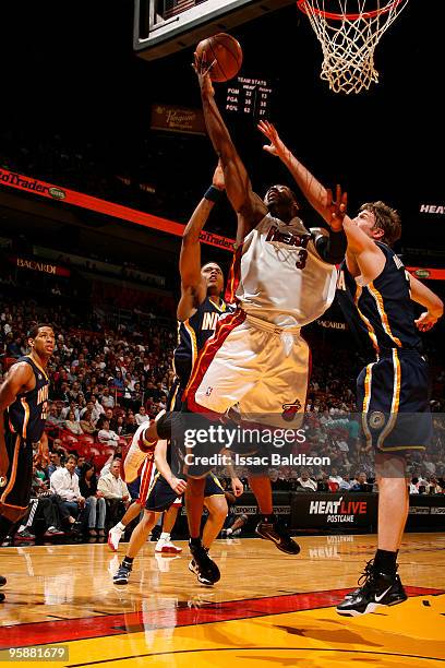 Dwyane Wade of the Miami Heat shoots against the Indiana Pacers on January 19, 2010 at American Airlines Arena in Miami, Florida. NOTE TO USER: User...