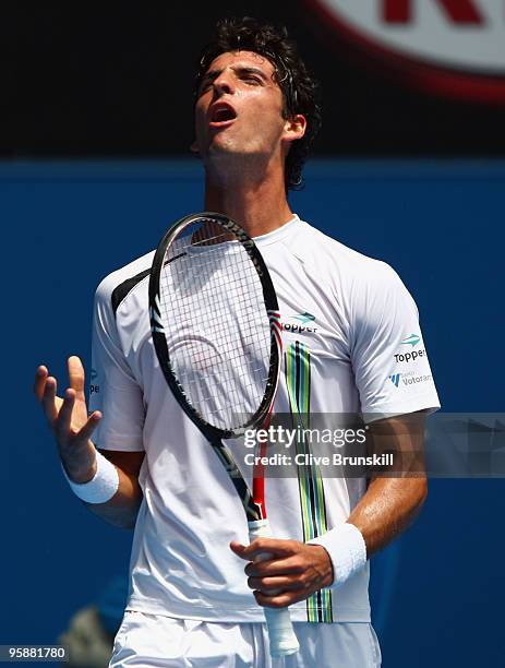 Thomaz Bellucci of Brazil reacts after a point in his second round match against Andy Roddick of the United States of America during day three of the...