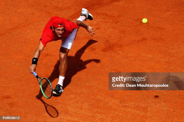 Lucas Pouille of France returns a forehand in his match against Andreas Seppi of Italy during day 3 of the Internazionali BNL d'Italia 2018 tennis at...
