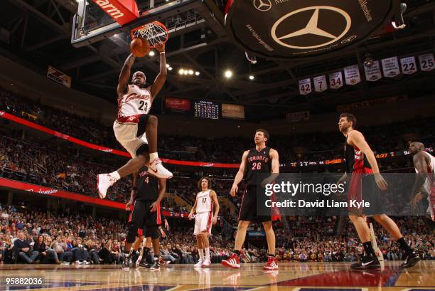 LeBron James of the Cleveland Cavaliers dunks the ball surrounded by Chris Bosh, Hedo Turkoglu and Andrea Bargnani of the Toronto Raptors on January...