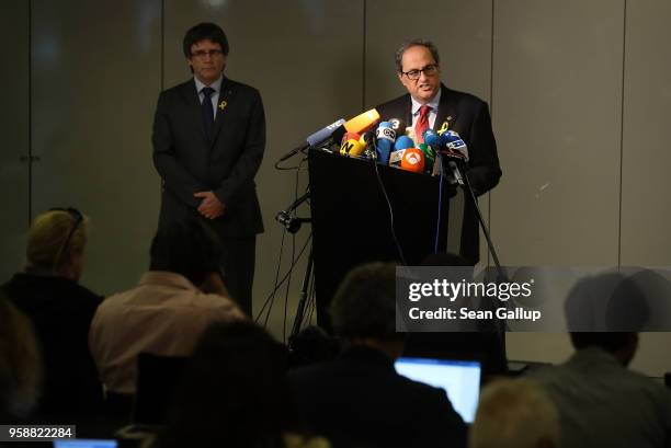 Former Catalan separitist leader Carles Puigdemont and newly-elected Catalan leader Quim Torra speak to the media on May 15, 2018 in Berlin, Germany....