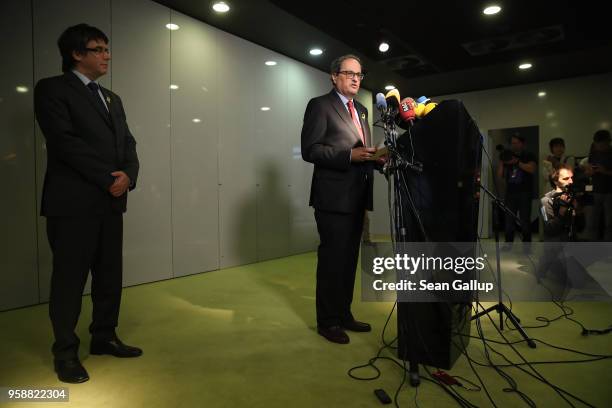 Former Catalan separitist leader Carles Puigdemont and newly-elected Catalan leader Quim Torra speak to the media on May 15, 2018 in Berlin, Germany....