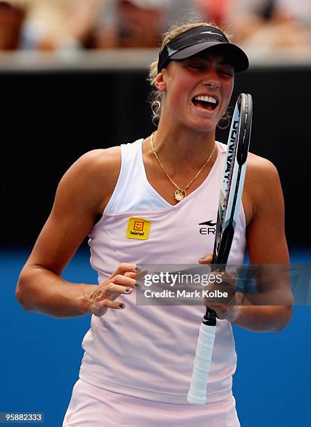 Yanina Wickmayer of Belgium celebrates winning a point in her second round match against Flavia Pennetta of Italy during day three of the 2010...