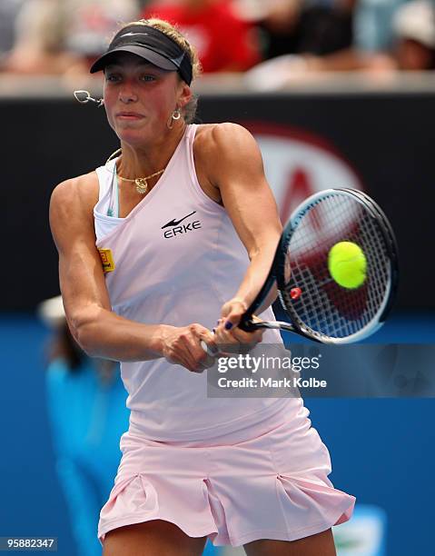 Yanina Wickmayer of Belgium plays a backhand in her second round match against Flavia Pennetta of Italy during day three of the 2010 Australian Open...