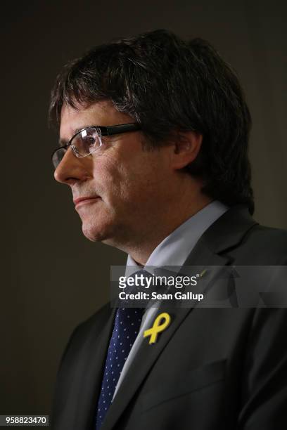 Former Catalan separitist leader Carles Puigdemont attends a press conference with newly-elected Catalan leader Quim Torra on May 15, 2018 in Berlin,...