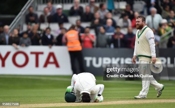 Imam ul-Haq kisses the ground after scoring the winning run on the fifth day of the international test cricket match between Ireland and Pakistan on...