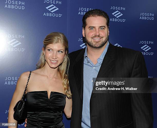 Amy O'Hara and Shaun O'Hara of the New York Giants attend the opening of the new Joseph Abboud state of the art brand studio at Joseph Abboud Studio...