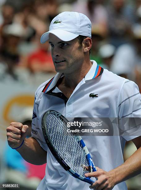 Tennis player Andy Roddick gestures during his men's singles match against Brazilian opponent Thomaz Bellucci on the third day of play at the...