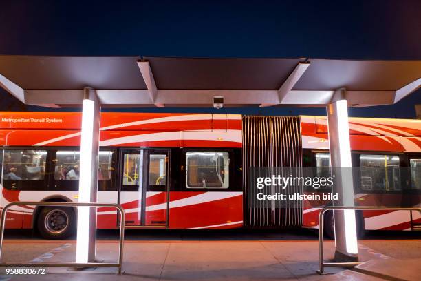 Upgraded Metropolitan Transit System bus-stop at City College Trolley Station with recently installed camera surveillance.