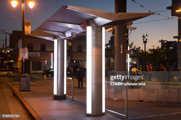 Upgraded Metropolitan Transit System bus-stop at City College Trolley Station with recently installed camera surveillance.