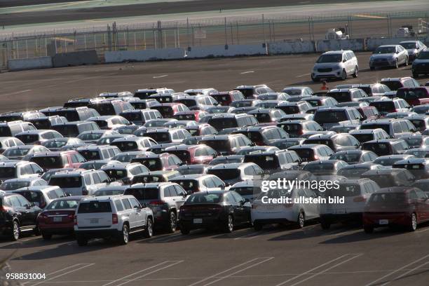 Rows of cars at the economy parking lot at San Diego International Airport.