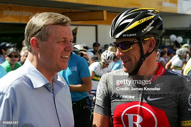 Lance Armstrong of America riding for Team RadioShack talking to South Australia Premier Mike Rann at the start of stage two of the 2010 Tour Down...