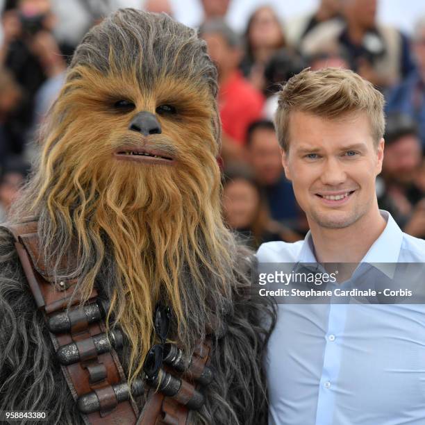 Actor Joonas Suotamo poses with the character he plays of Chewbacca as they attend the photocall for "Solo: A Star Wars Story" during the 71st annual...