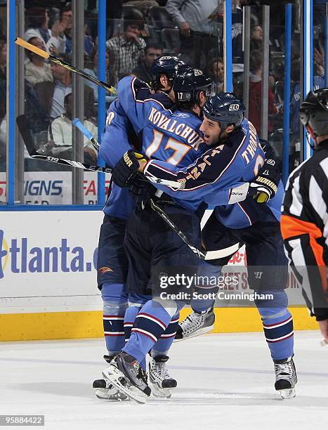 Ilya Kovalchuk of the Atlanta Thrashers is congratulated by Chris Thorburn after scoring against the Toronto Maple Leafs at Philips Arena on January...