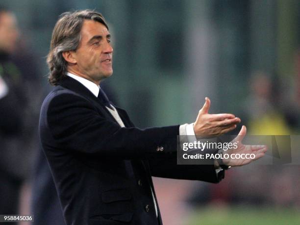 Inter Milan's coach Roberto Mancini gestures during Lazio vs Inter Milan Serie A football match at Rome's Olympic stadium 12 March 2005. The match...