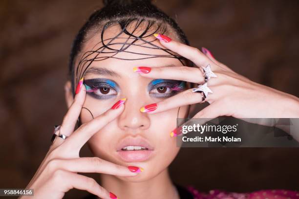 Model poses backstage ahead of the Romance Was Born show at Mercedes-Benz Fashion Week Resort 19 Collections at Restaurant Hubert on May 15, 2018 in...