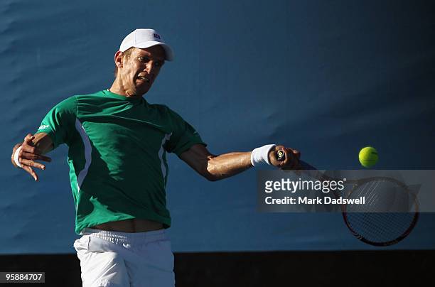 Jarkko Nieminen of Finland plays a forehand in his second round match against Florent Serra of France during day three of the 2010 Australian Open at...