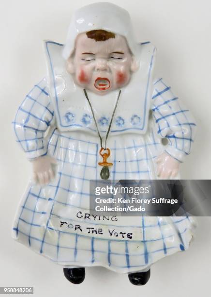 Anti-suffrage ashtray in the form of a crying, female child, or child-like woman, labeled “Crying for the Vote, ” intended to depict suffrage...