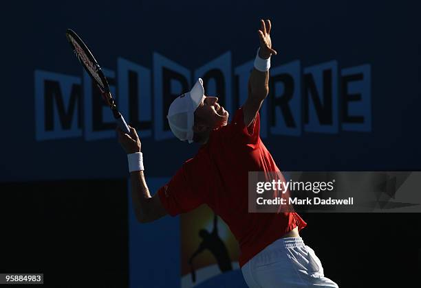 Jarkko Nieminen of Finland serves in his second round match against Florent Serra of France during day three of the 2010 Australian Open at Melbourne...