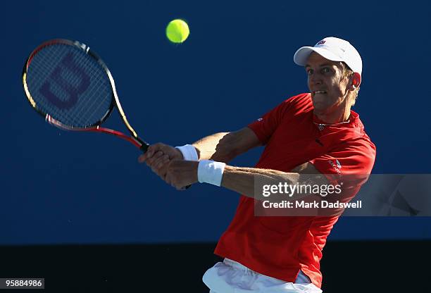 Jarkko Nieminen of Finland plays a backhand in his second round match against Florent Serra of France during day three of the 2010 Australian Open at...
