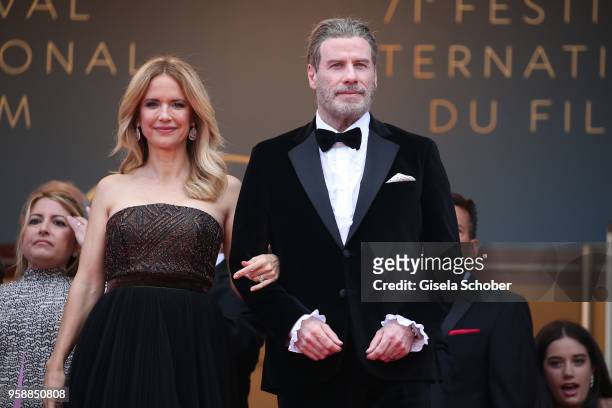 Kelly Preston and John Travolta attend the screening of "Solo: A Star Wars Story" during the 71st annual Cannes Film Festival at Palais des Festivals...