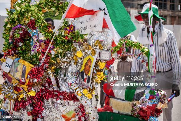 Man pushes his decorated wheelbarrow during celebrations of the 27th anniversary of self-declared independence of Somaliland in Hargeisa,...