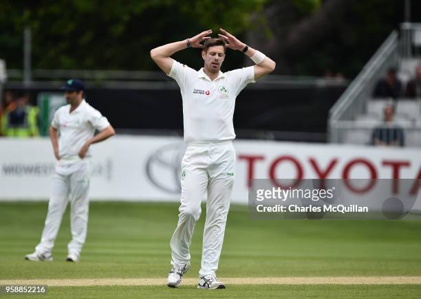 Boyd Rankin of Ireland reacts to Imam ul-Haq's boundary during the fifth day of the international test cricket match between Ireland and Pakistan on...